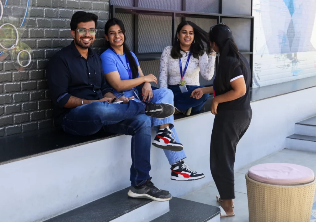 people sitting and chatting outdoors