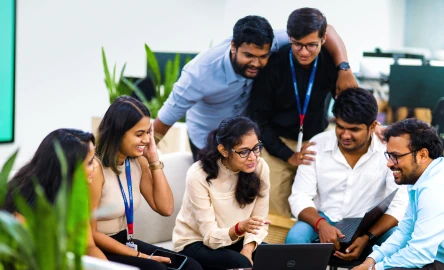 Team members collaborating together in a modern office