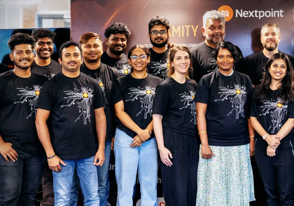 Team members standing together at a company event