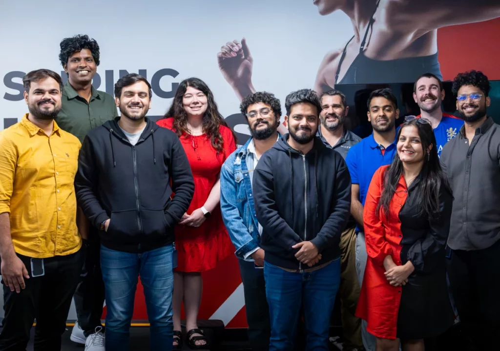 team members posing together for a group photo