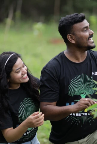 two people smiling outdoors