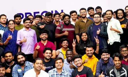 group photo of the team in the office