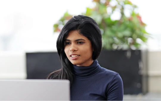 Woman working on a laptop