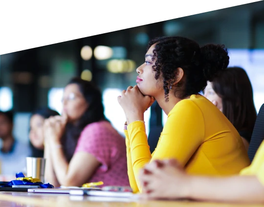 Team members listening during a meeting in a modern office